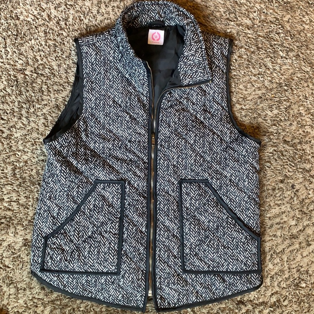 White and black vest
